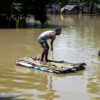 villager uses a custom made raft