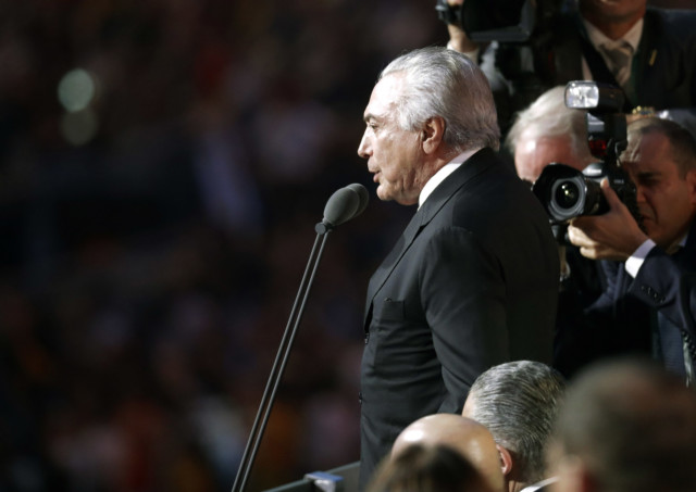 Acting Brazilian President Michel Temer was booed by protesters during the opening ceremony for the 2016 Summer Olympics Friday, Aug. 5, 2016. (AP Photo/Markus Schreiber)