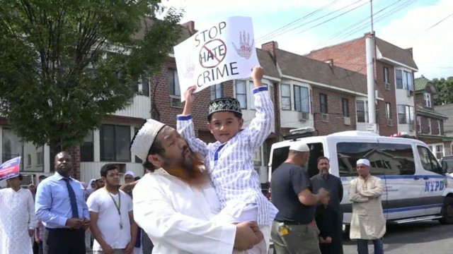 Young Muslim boy at anti-Islamophobia protest.