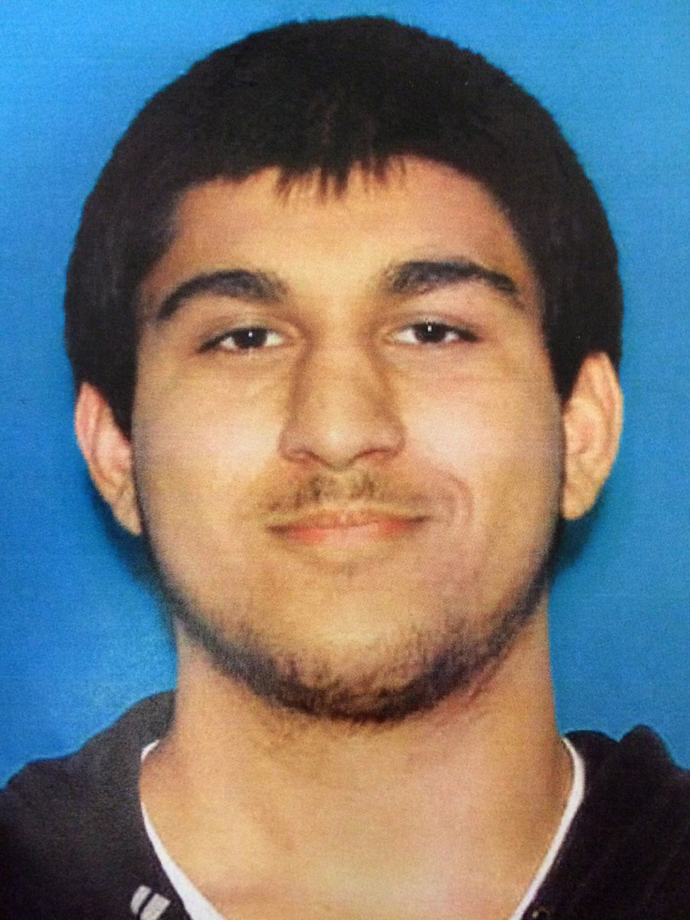 This undated Department of Licensing photo posted Saturday, Sept. 24, 2016, by the Washington State Patrol on its Twitter page shows Arcan Cetin, 20, of Oak Harbor, Wash. Patrol Sgt. (Washington State Patrol via AP)