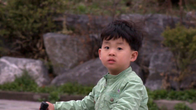 Korean child on bike