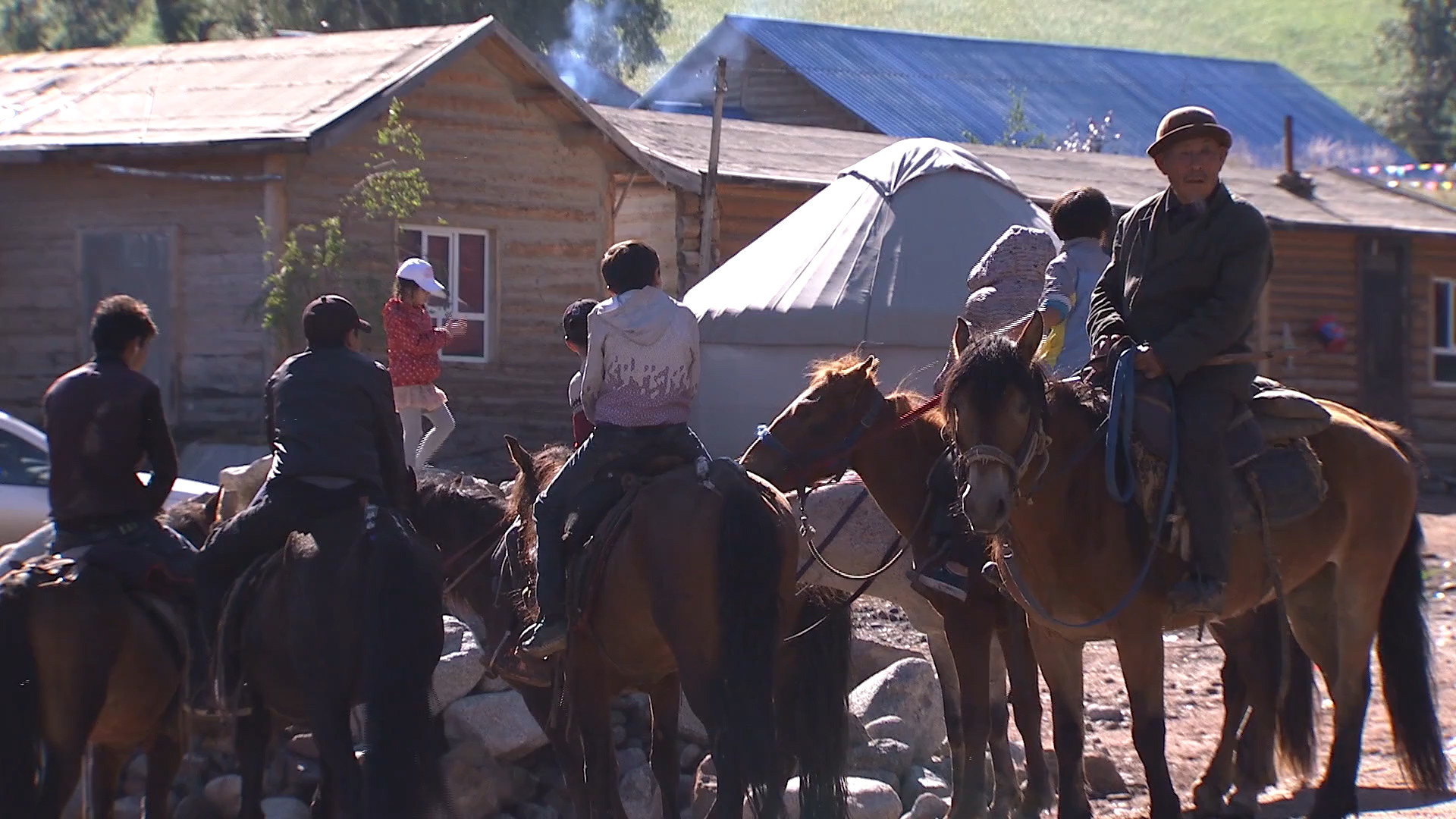 A group of tourists preparing to travel through the hills that once belonged to the nomads.