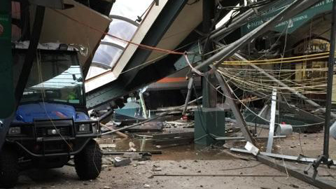 This Thursday, Sept. 29, 2016 photo provided by a passenger who was on the train when it crashed shows wreckage at the Hoboken, N.J. rail station. The commuter train barreled into the station during the morning rush hour, coming to a halt in a covered area between the station's indoor waiting area and the platform. (AP Photo)