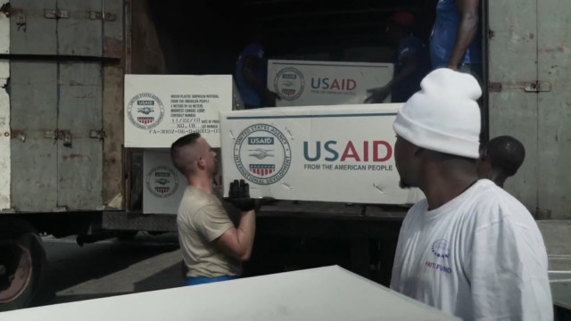 Aid trickles into Haiti as desperation grows