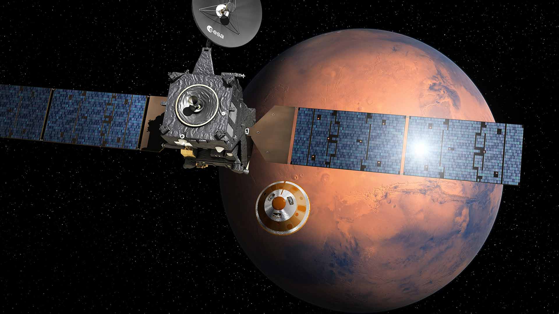 Artist’s impression provided by the European Space Agency, ESA, depicting the separation of the ExoMars 2016 entry, descent and landing demonstrator module, named Schiaparelli, center, from the Trace Gas Orbiter, TGO, and heading for Mars. The separation is scheduled to occur on Sunday Oct. 16, 2016, about seven months after launch. (ESA/D. Ducros via AP)