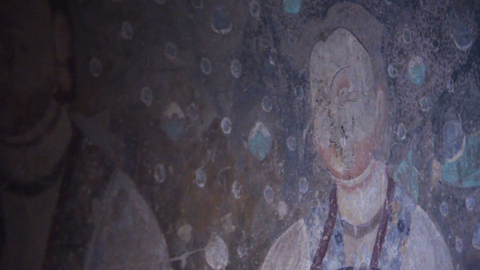 Closeup of ancient Buddhist mural