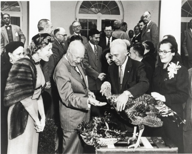 Eisenhower feeds cranberry to turkey
