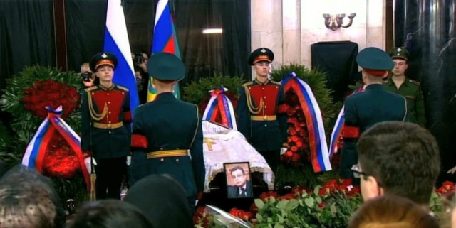 Putin, mourners attend memorial service for Russian ambassador