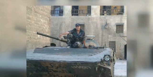 Sole female soldier fights in brutal Aleppo conflict