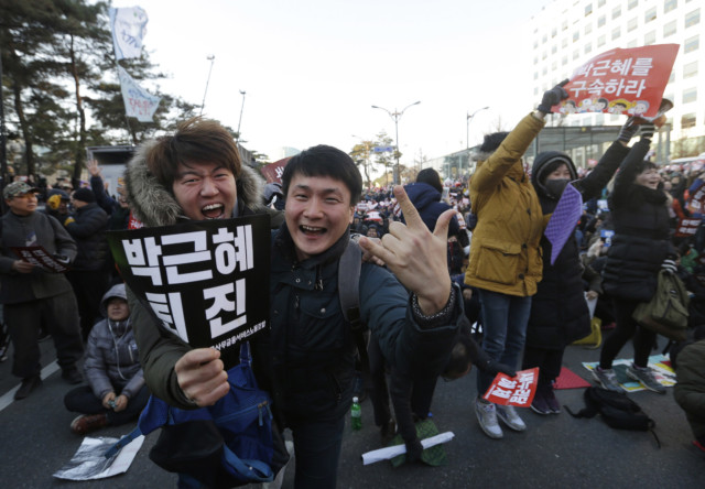 South Koreans react after impeachment of President Park