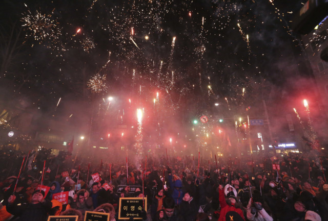 Protesters set off fireworks