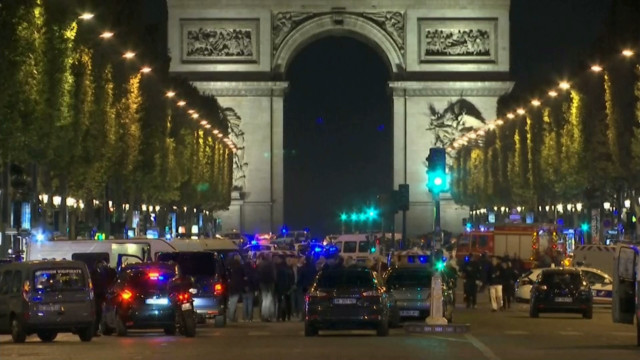 Paris police say officer and attacker shot, killed on the Champs-Elysees