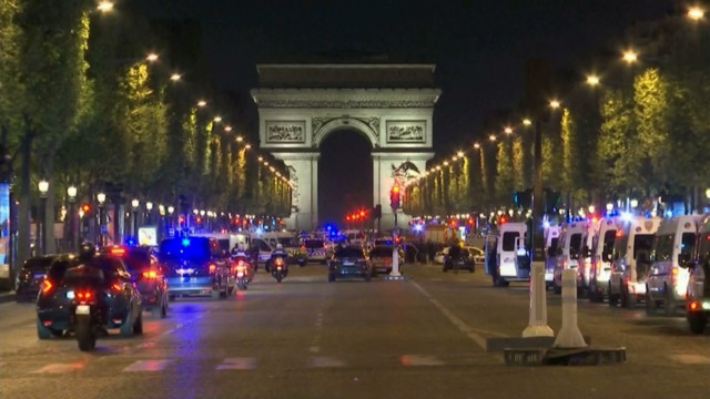 Paris police say officer and attacker shot, killed on the Champs-Elysees