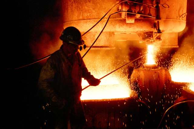 File photo of a worker in steel production plant.