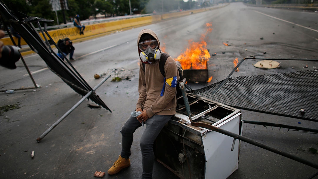What is the story behind the protests in Venezuela?