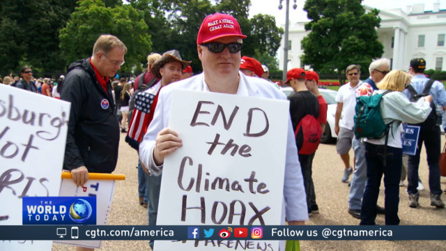 Demonstrators hold competing Trump rallies focused on Russia, climate