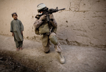 Afghan boy and US soldier