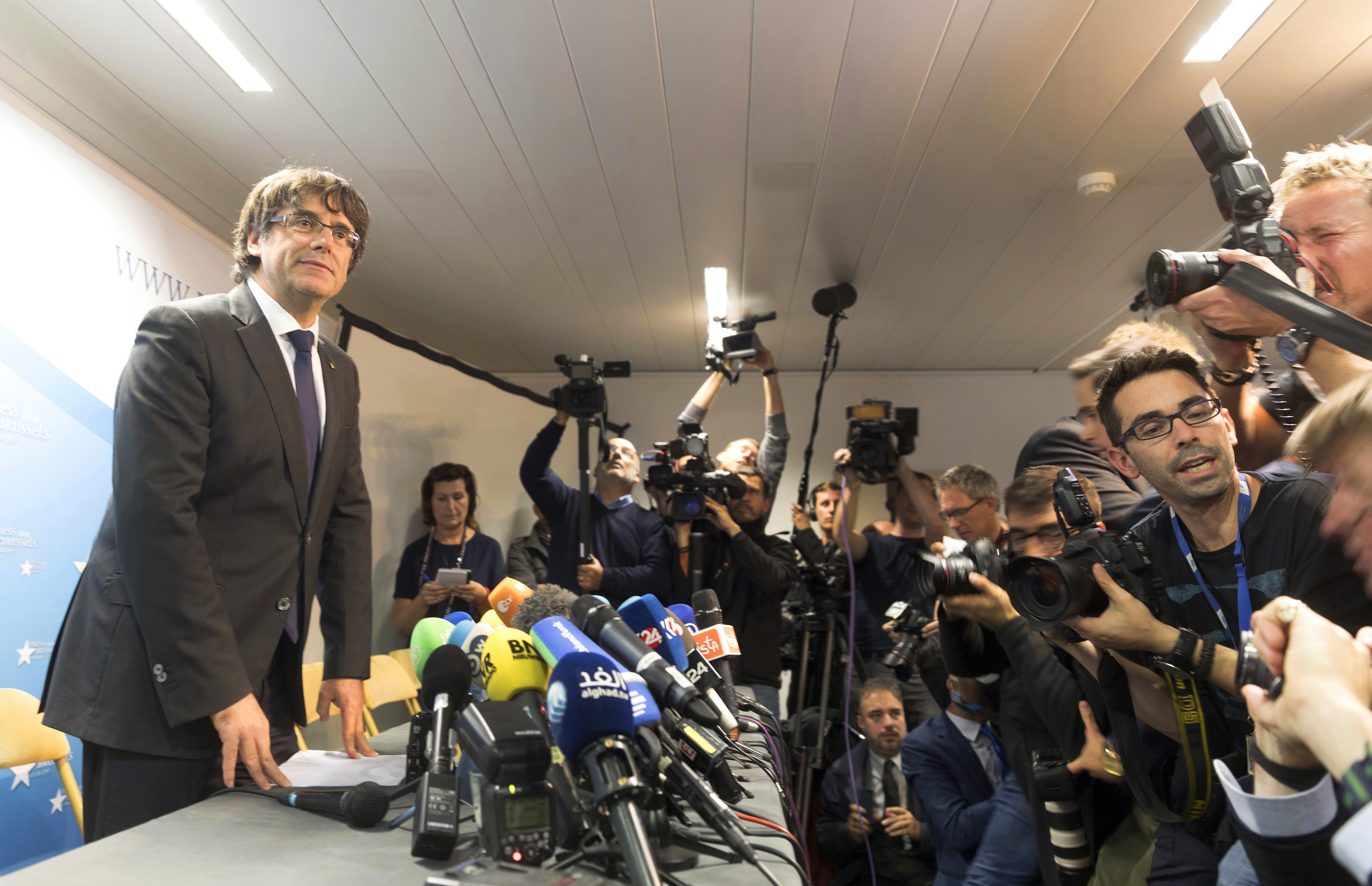 Catalonia’s deposed president Carles Puigdemont surfaces in Brussels