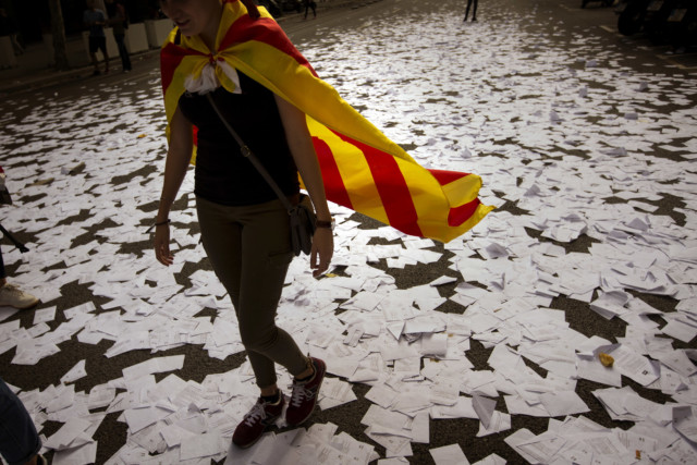woman wearing an estelada or independence flag