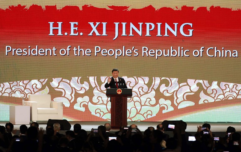 China's President Xi Jinping speaks on the final day of the APEC CEO Summit