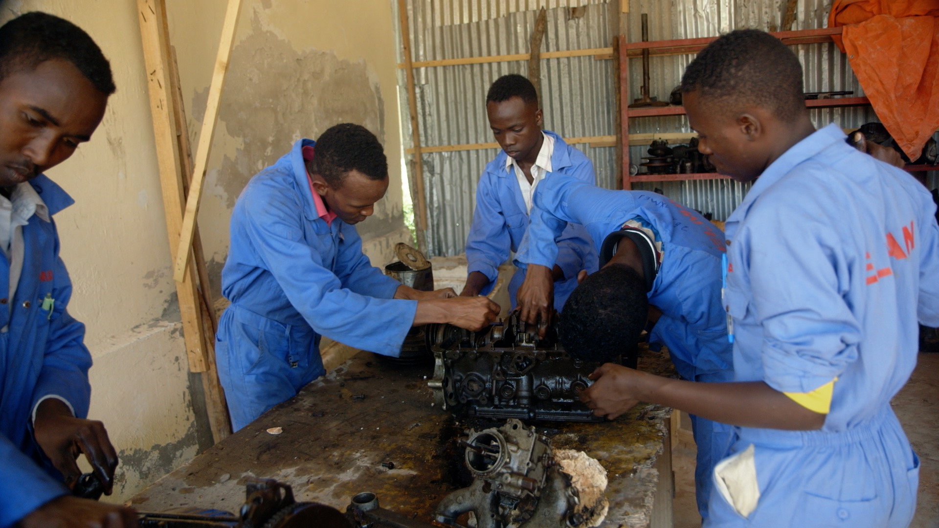 Former al Shabaab fighters learn work and life skills in a rehabilitation center.