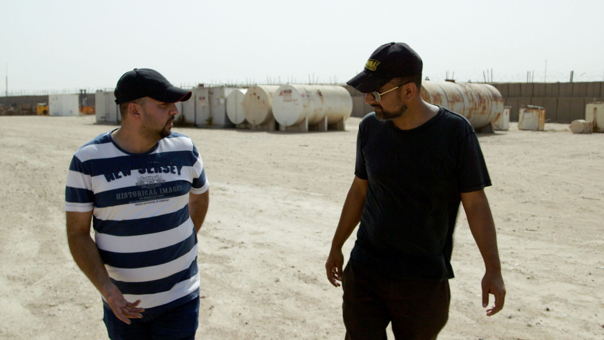 Suroosh is given a tour of Camp Bucca by former detainee Mahmood Zaki, who calls the camp a “school” for terrorists.