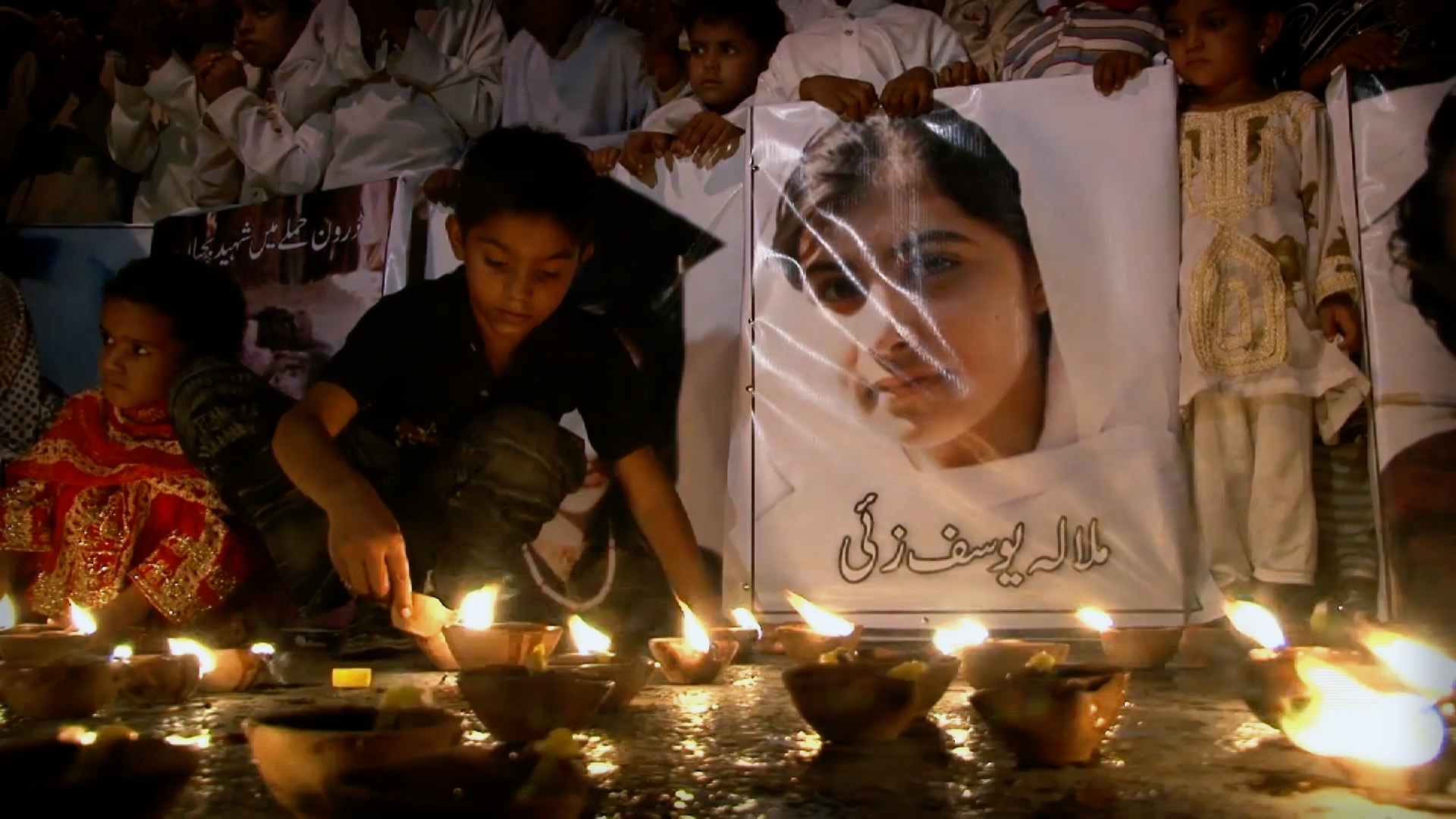 A vigil is held for Malala Yousafzai, the young Pakistani activist who survived being shot in the head by the TTP.