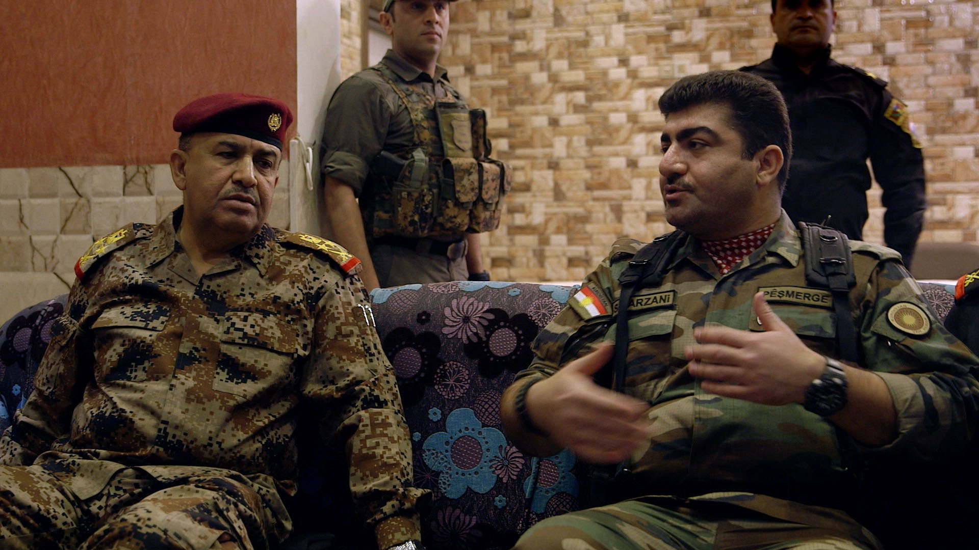 A Peshmerga general hands over the operation to take Mosul, to his Iraqi counterpart. 