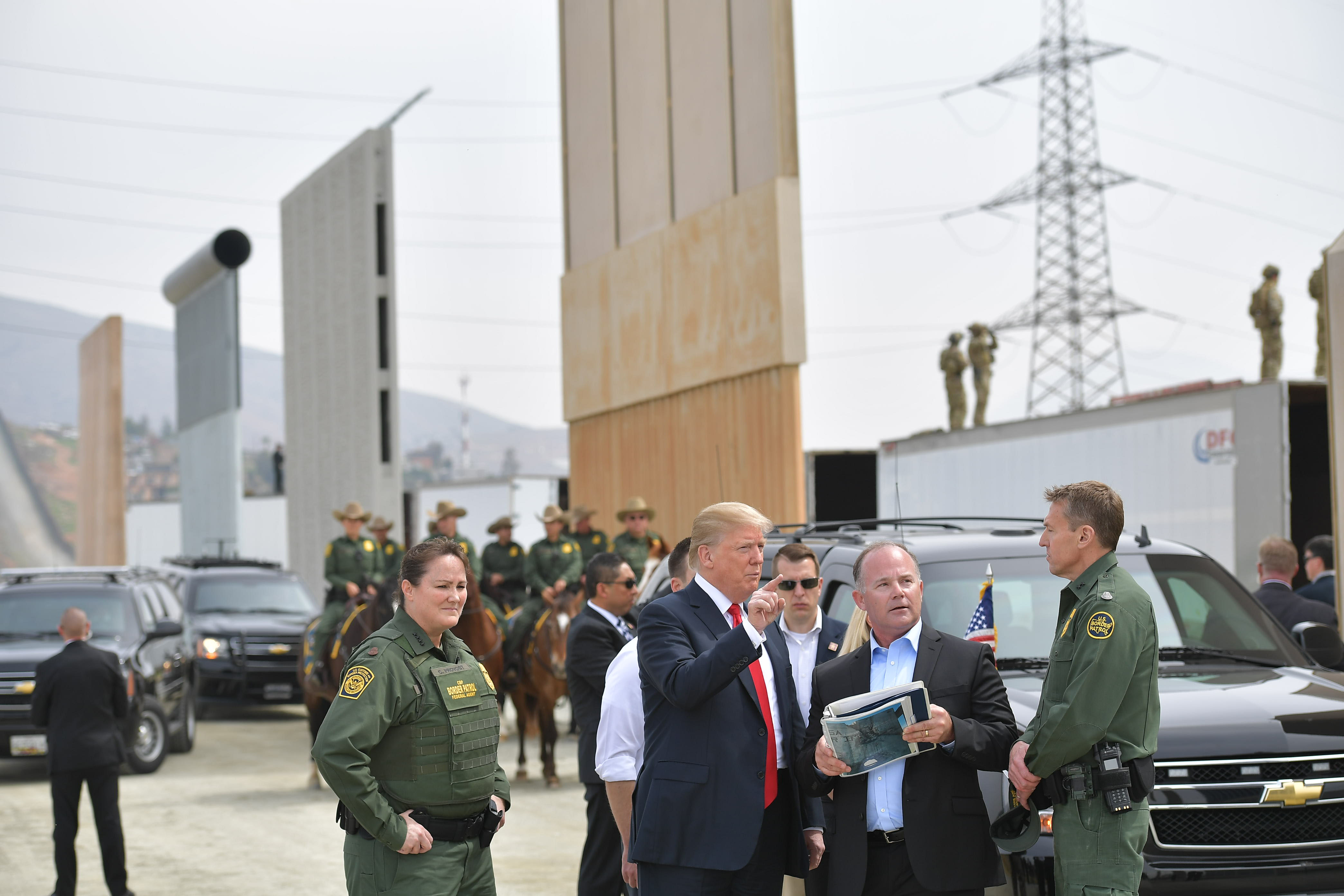 Trump visits eight towering prototypes for proposed wall with Mexico