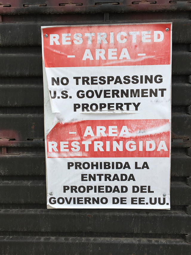 A restricted area sign on the border wall San Ysidro, CA