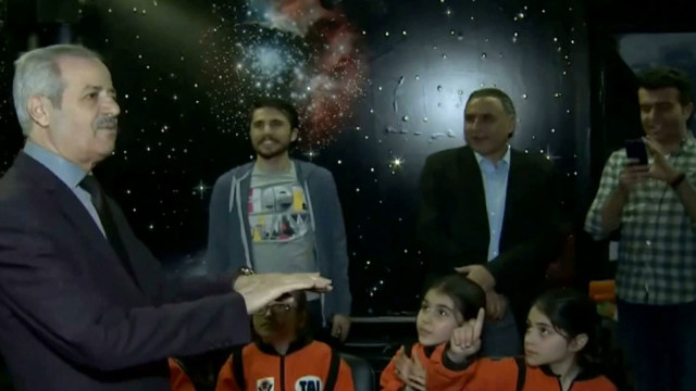 Syria's first astronaut helps support refugees fleeing conflict