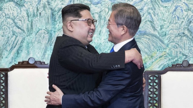 ROK President Moon Jae-in and DPRK leader Kim Jong Un embrace