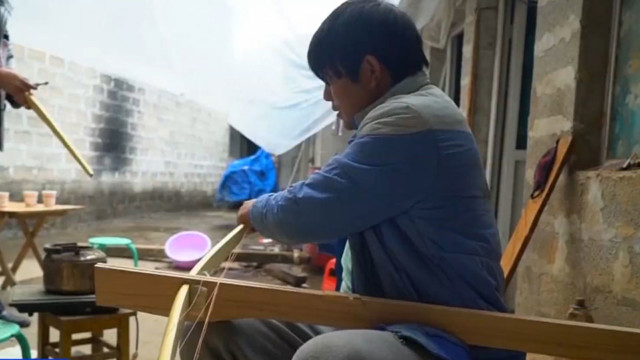 Chinese crossbow shooters and wood turners try to preserve ethnic traditions