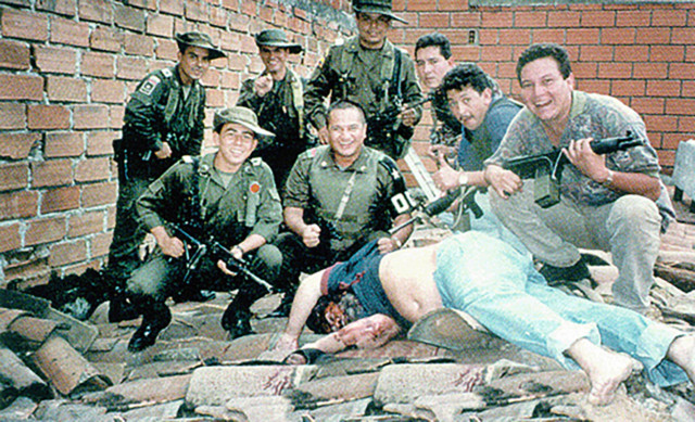 Members of Search Bloc celebrate over Escobar's body