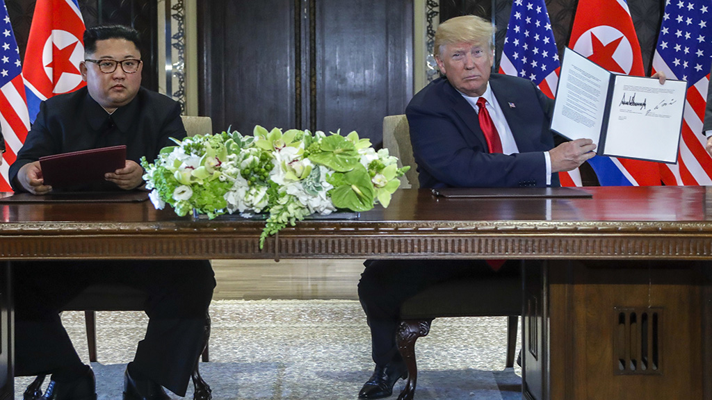 Trump and Kim sign document agreeing to further cooperation
