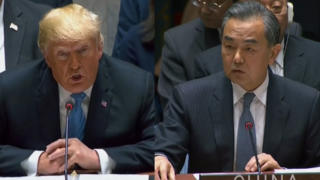 U.S. President Donald Trump and China’s State Councilor and Foreign Minister Wang Yi at U.N. Security Council meeting.