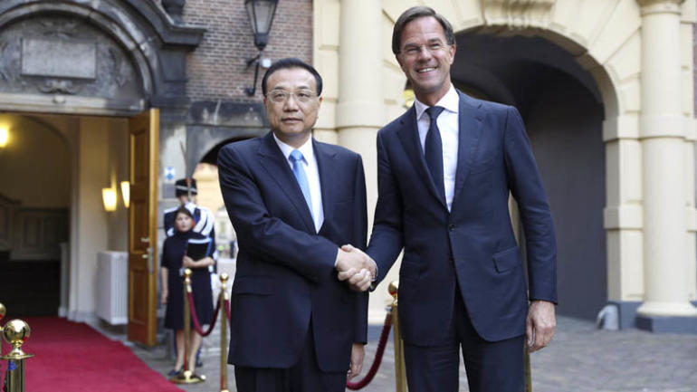 Chinese Premier Li Keqiang shakes hands with Dutch Prime Minister Mark Rutte
