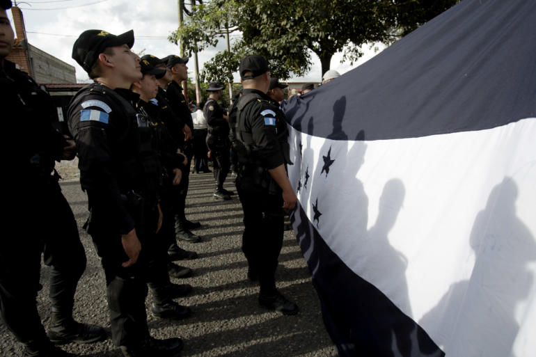 Guatemalan police temporarily block the ro