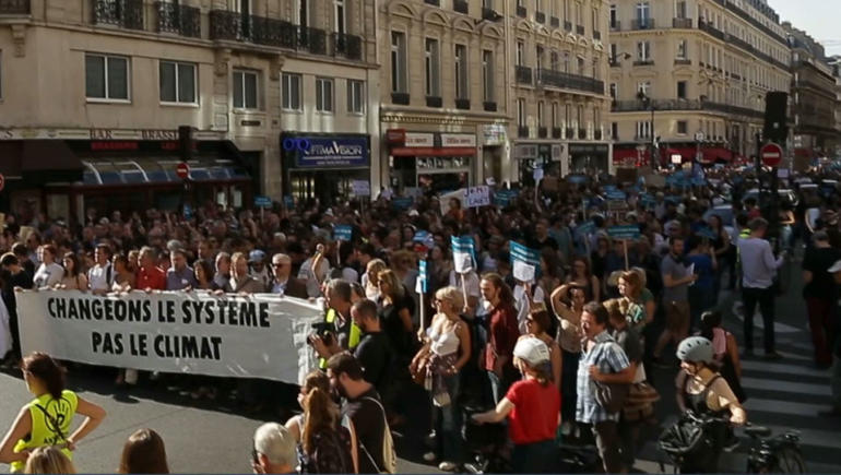 Demonstrators across France demand action to curb climate change