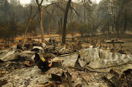 California wildfires reach grim milestone as officials search for cause