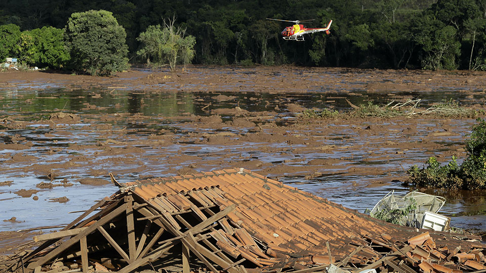 Frantic search for survivors in Brazilian mining dam collapse