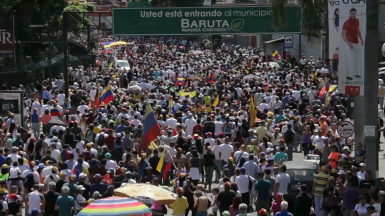 Guaido calls for Venezuela defections as Maduro stands firm