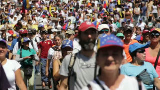 Global demonstrations increase pressure in Venezuela's political crisis