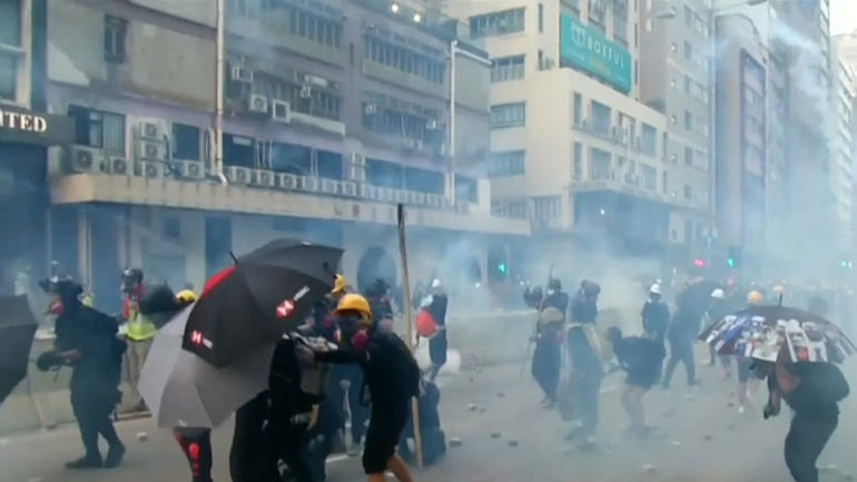 Violence erupts as protestors and police clash in Hong Kong