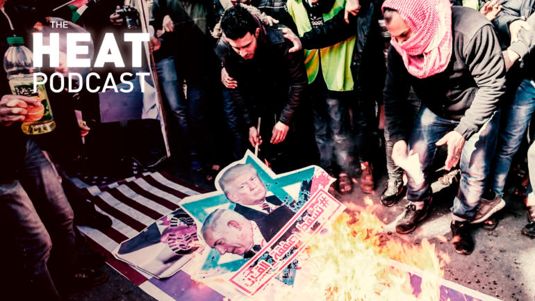 Palestinian demonstrators burn portraits of U.S. President Donald Trump