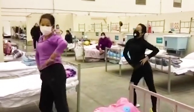 Coronavirus patients dance at makeshift Wuhan hospital