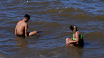 Two bathers in Rio De La Plata.