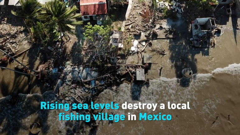 Rising sea levels destroy a local fishing village in Mexico