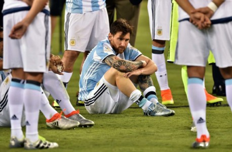 Argentina's Lionel Messi waits to receive the second place medal during the Copa America Centenario awards