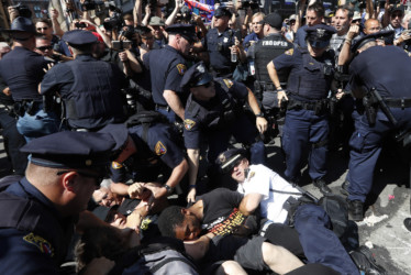 Police confront protesters Police confront protesters